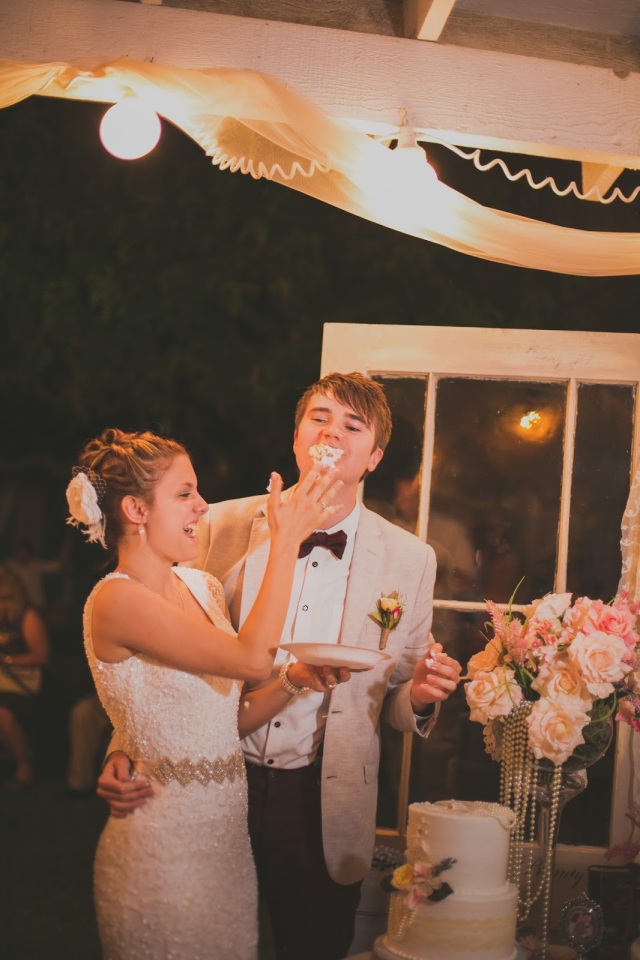 smashing of the cake in the grooms face
